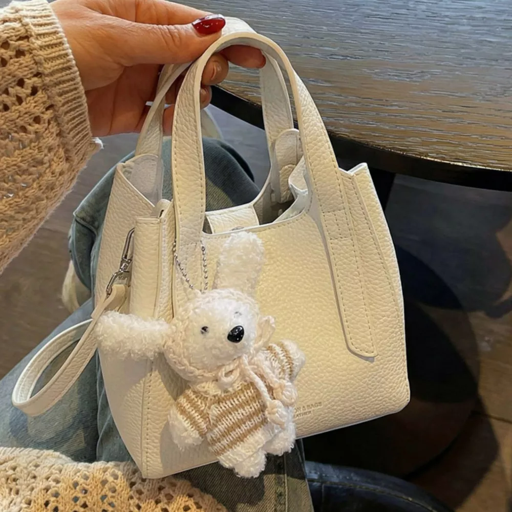 Chic Textured Leather Crossbody Bag with Adorable Charm, image 2