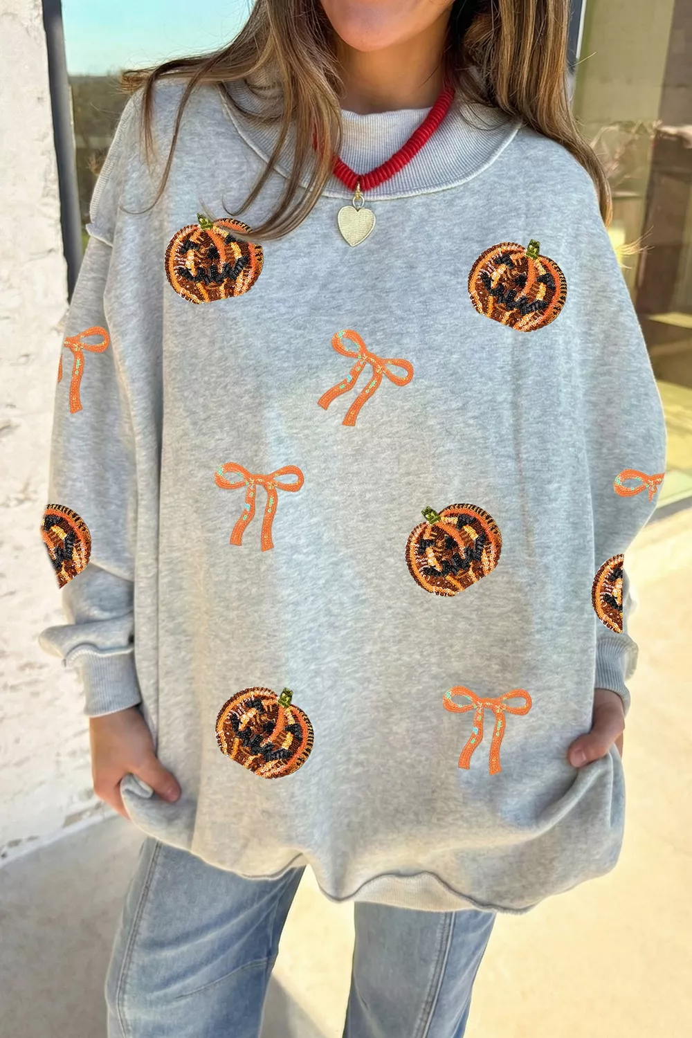 Sequin Pumpkin Face Bow Exposed Seam Halloween Sweatshirt, image 2