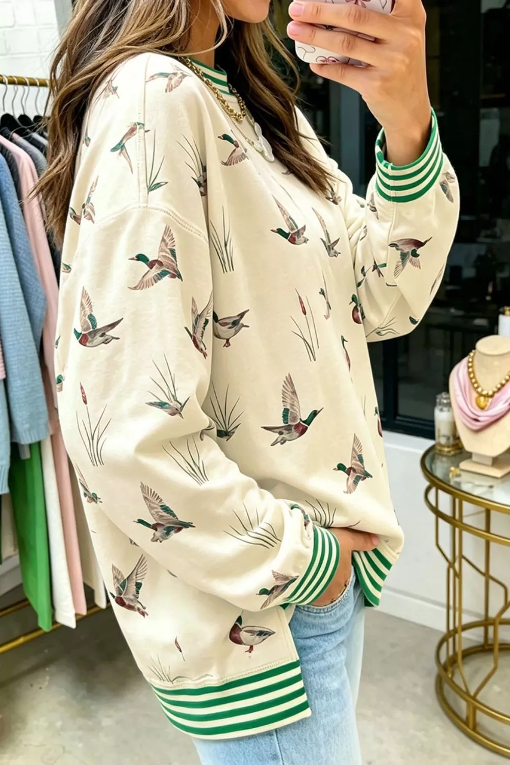 Whimsical Duck Print Sweatshirt with Striped Trim, image 2