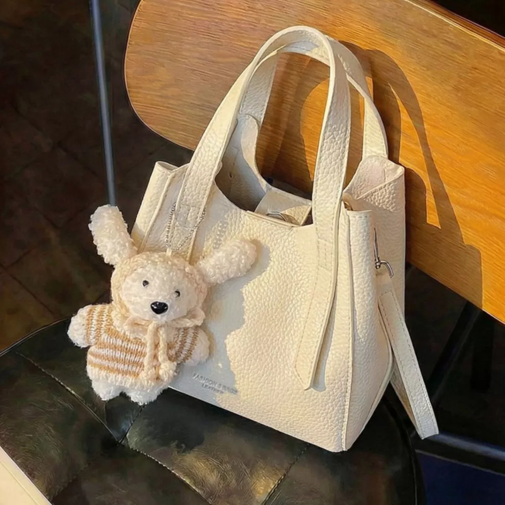 Chic Textured Leather Crossbody Bag with Adorable Charm, image 4