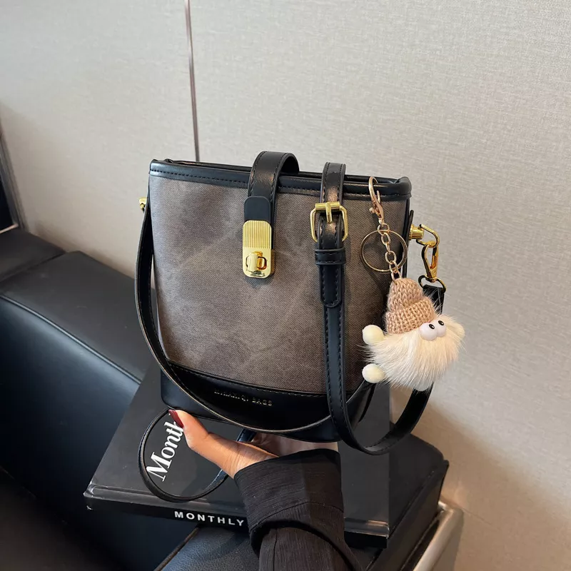Vintage Bucket Crossbody Bag with Plush Charm