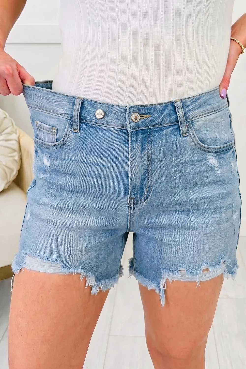 Asymmetric Raw Hem Distressed Whiskery Denim Shorts