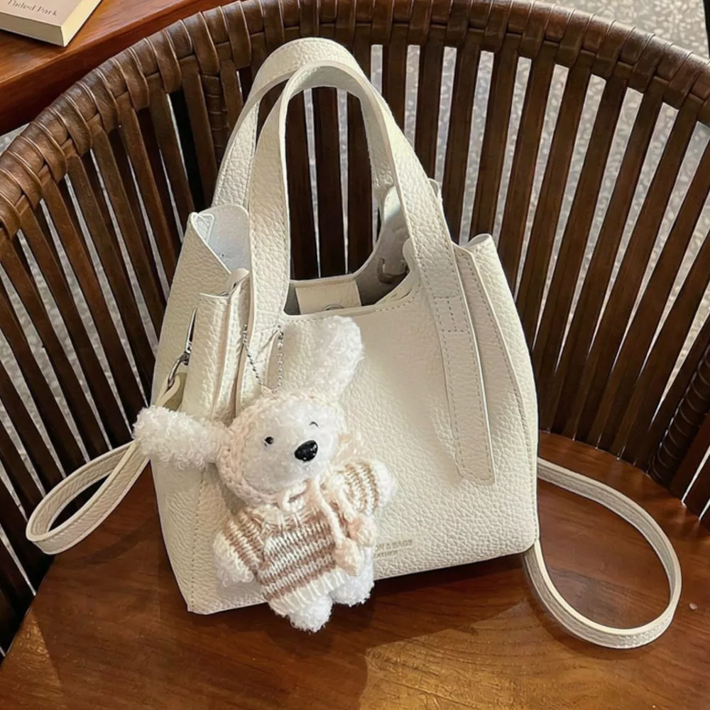 Chic Textured Leather Crossbody Bag with Adorable Charm, image 7
