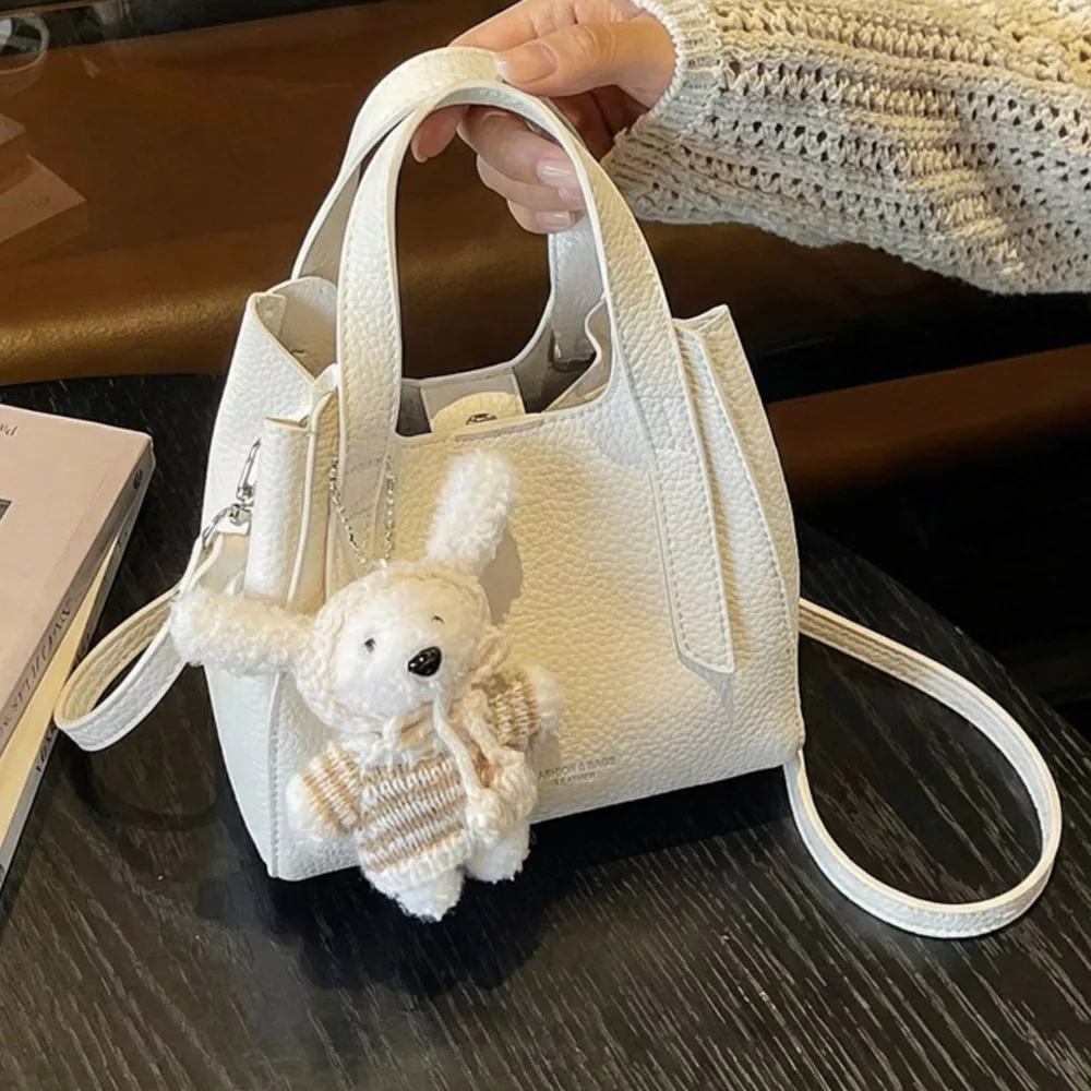 Chic Textured Leather Crossbody Bag with Adorable Charm, image 3