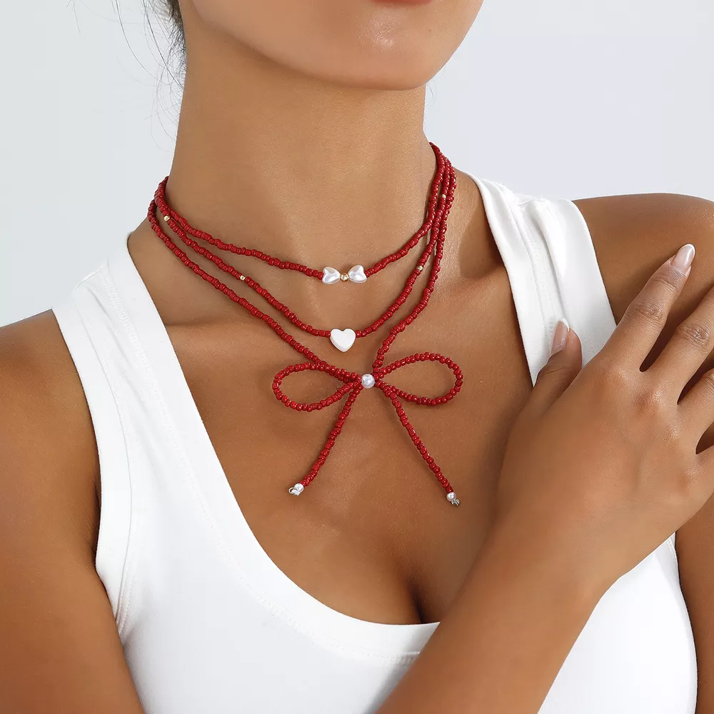 Beaded Bow Necklace with Heart Pendants, image 2