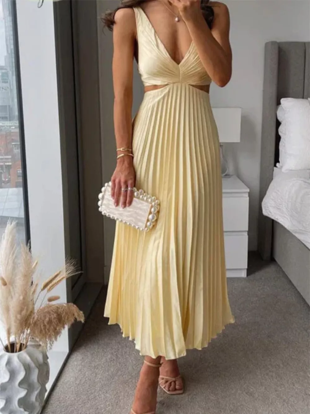 Elegant Pleated Midi Dress with Cut-out Details