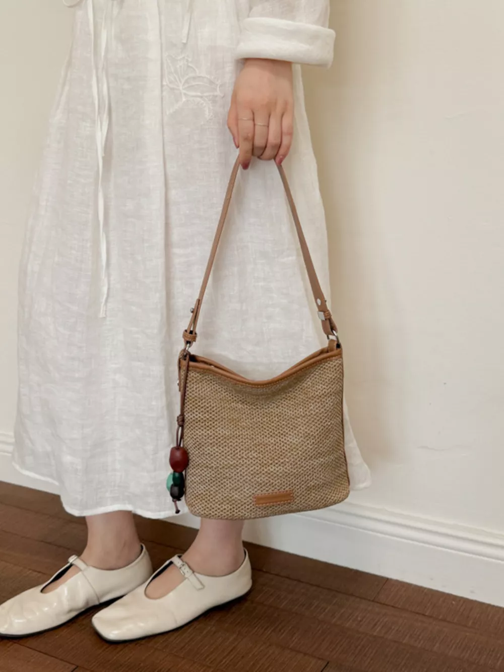 Straw Crossbody Bag with Leather Trim and Tassel Charm, image 3
