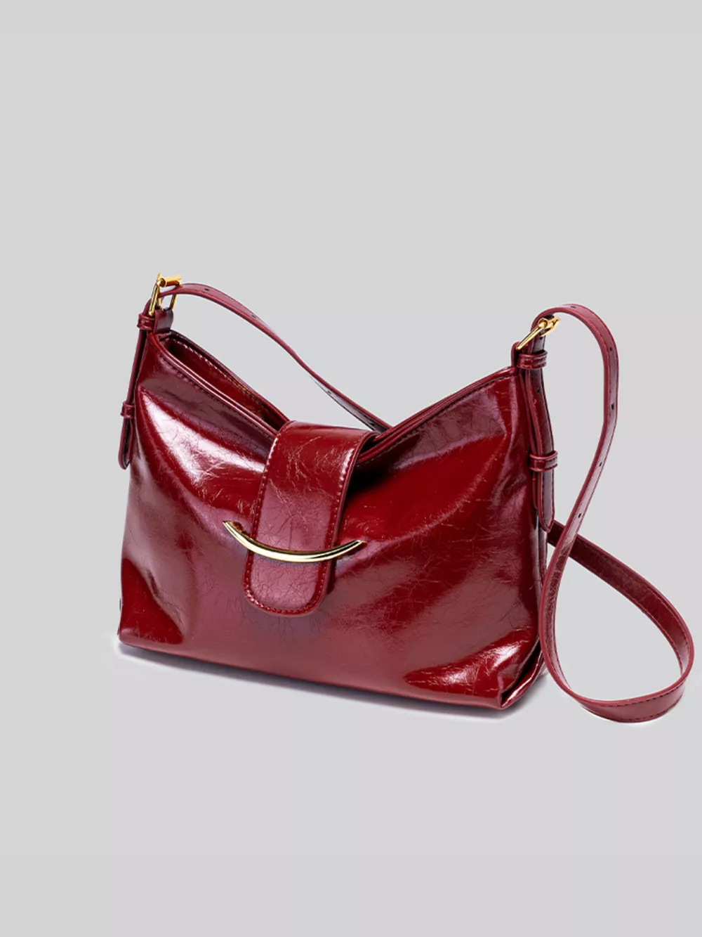 Elegant Glossy Patent Leather Shoulder Bag with Crescent Gold Accent, image 4