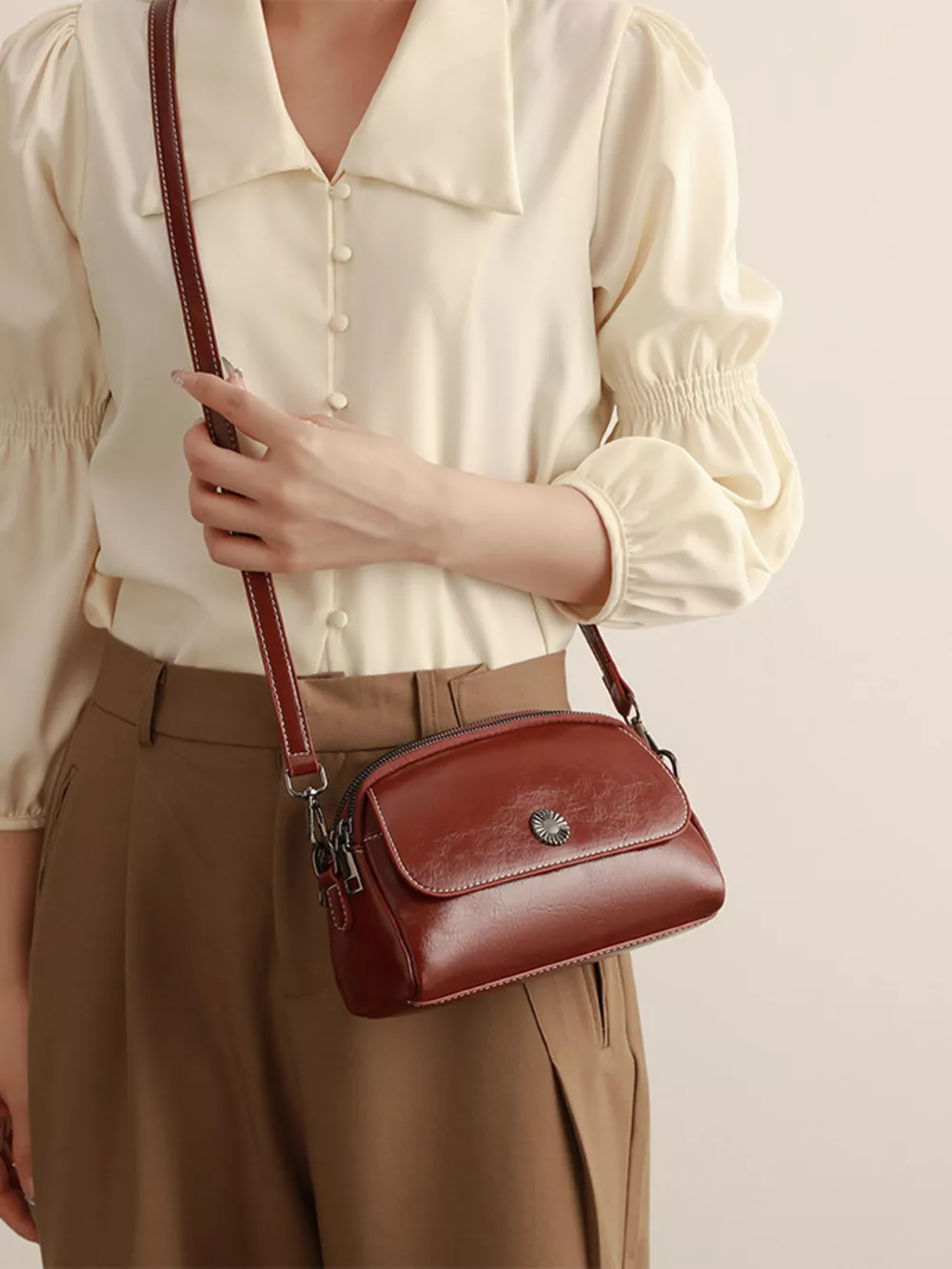 PU Leather Crossbody Bag with Metal Emblem Detail