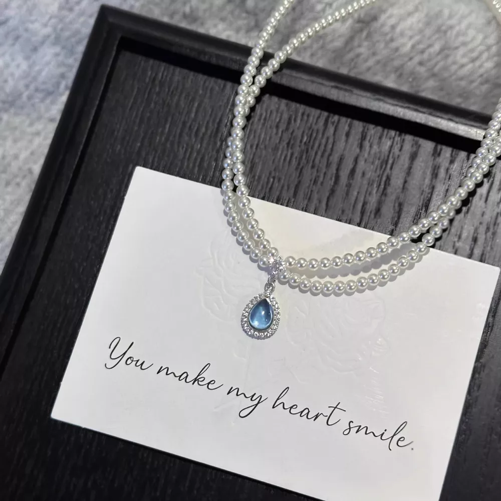 Double Layered Pearl Necklace with Teardrop Pendant